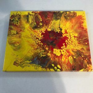 Yellow acrylic dutch pour painting.
